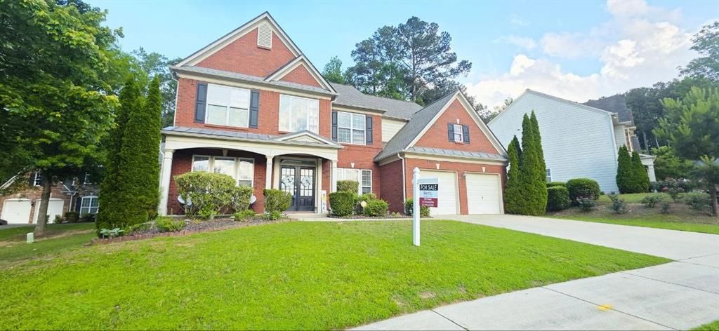 Image 1 of property listing at 779 Avonley Creek Trace, Sugar Hill, GA 30518