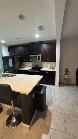 1198 SAND TORCH CIRCLE, Davenport, FL 33837