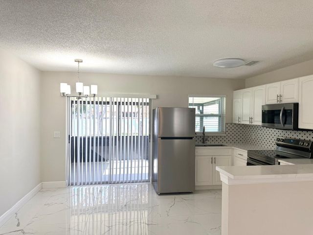 699 NW Riverside Drive, Port St. Lucie, Port St Lucie, FL 34983