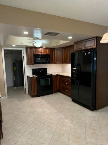9129 W Highland Pines Boulevard, Palm Beach Gardens, FL 33418