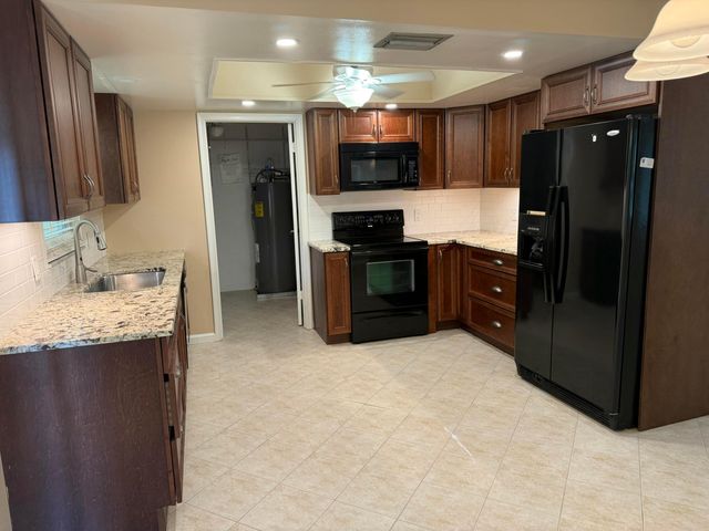 9129 W Highland Pines Boulevard, Palm Beach Gardens, FL 33418