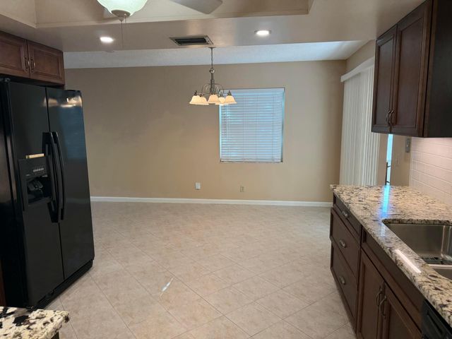 9129 W Highland Pines Boulevard, Palm Beach Gardens, FL 33418