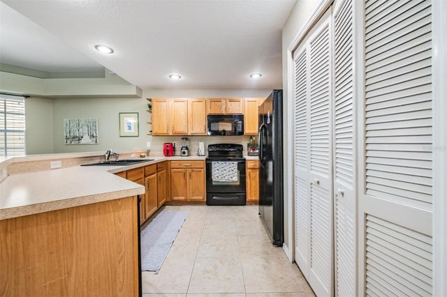 1827 HAMMOCKS AVENUE 1827, Lutz, FL 33549