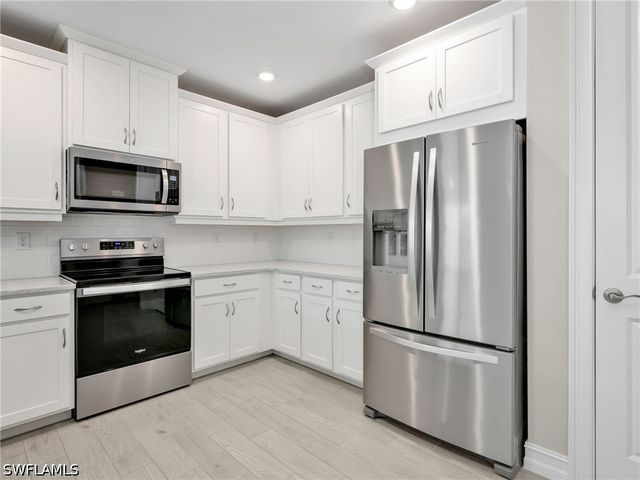 21900 Milan Villas LN, Estero, FL 33928