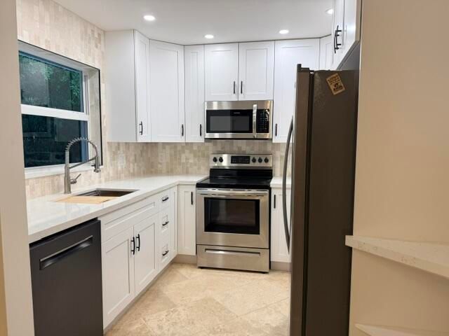550 SW Natura Avenue, Deerfield Beach, FL 33441