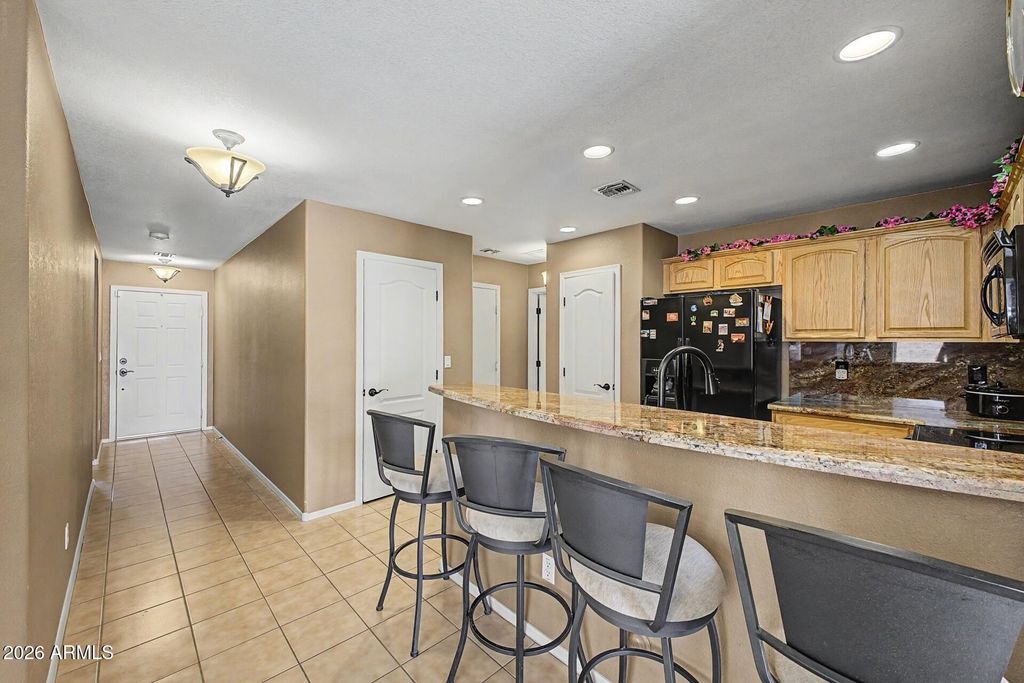 Image 9 of property listing at 17706 W RED BIRD Road, Surprise, AZ 85387