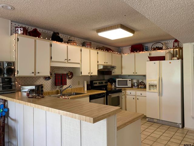 631 Holly Trail East, Unit 101, Holly Lake Ranch, TX 75765