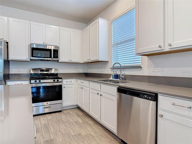 5704 BRISTLELEAF COURT, Leesburg, FL 34748