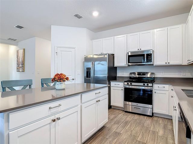 5704 BRISTLELEAF COURT, Leesburg, FL 34748