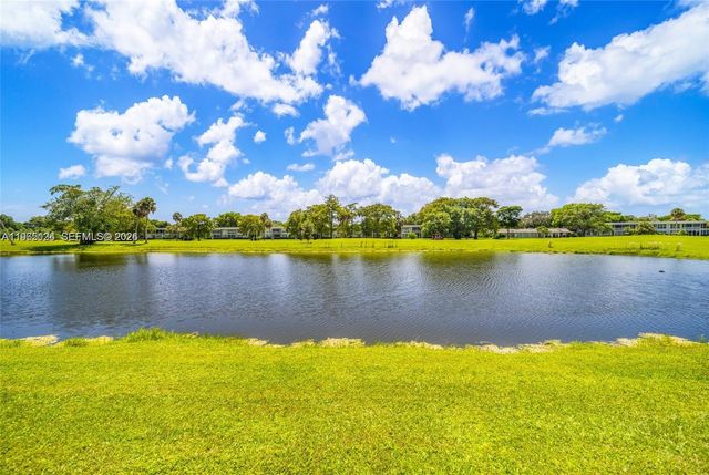 4030 W Palm Aire Drive 104, Pompano Beach, FL 33069