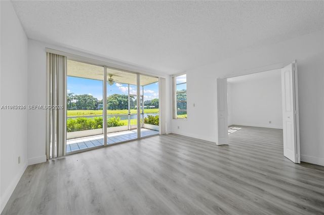 4030 W Palm Aire Drive 104, Pompano Beach, FL 33069