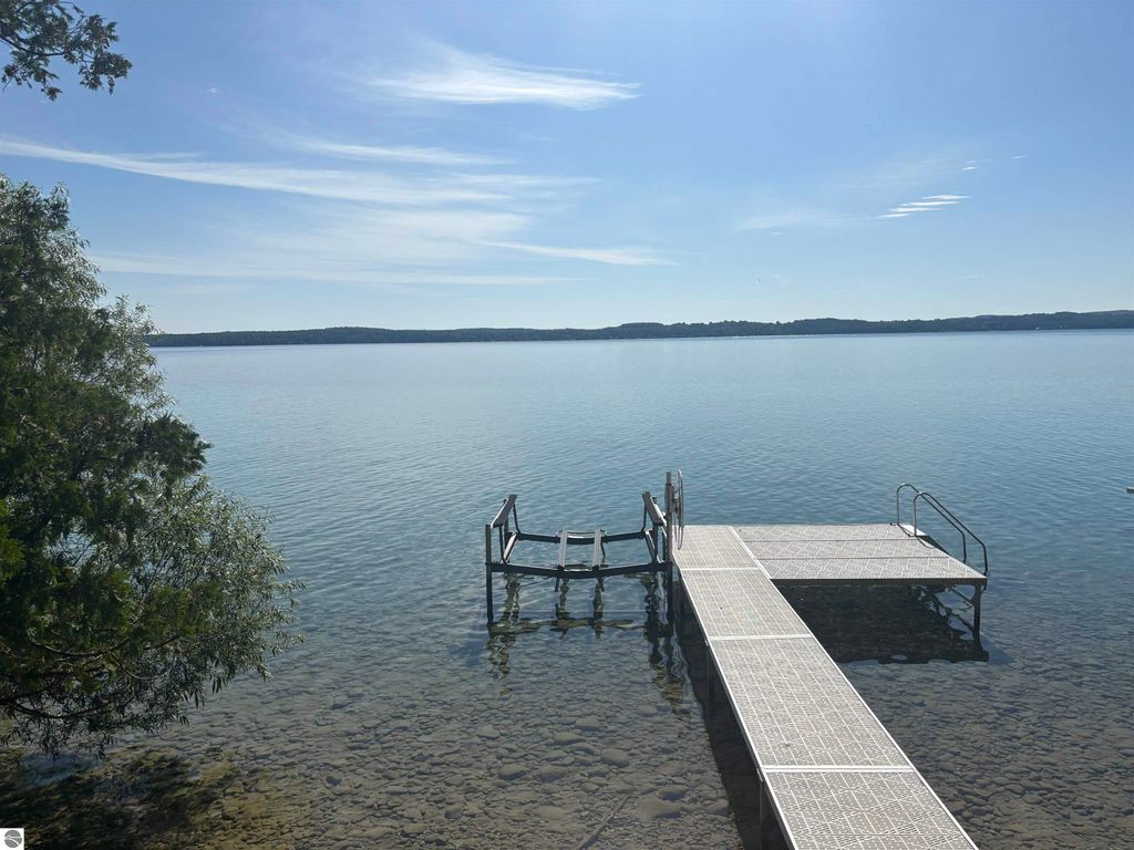 Image 19 of property listing at 7681 NW Torch Lake Drive, Kewadin, MI 49648