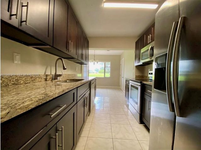 6105 Royal Poinciana Ln, Tamarac, FL 33319