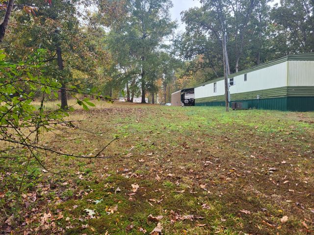 60 White Oak Dr, Big Sandy, TN 38221