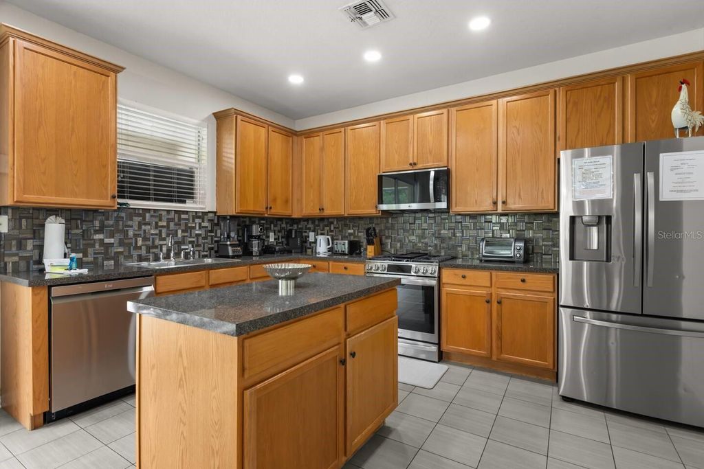 Image 8 of property listing at 4910 HAROLD STANLEY DRIVE, Kissimmee, FL 34758