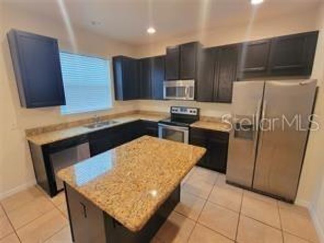 9571 SILVER BUTTONWOOD STREET, Orlando, FL 32832