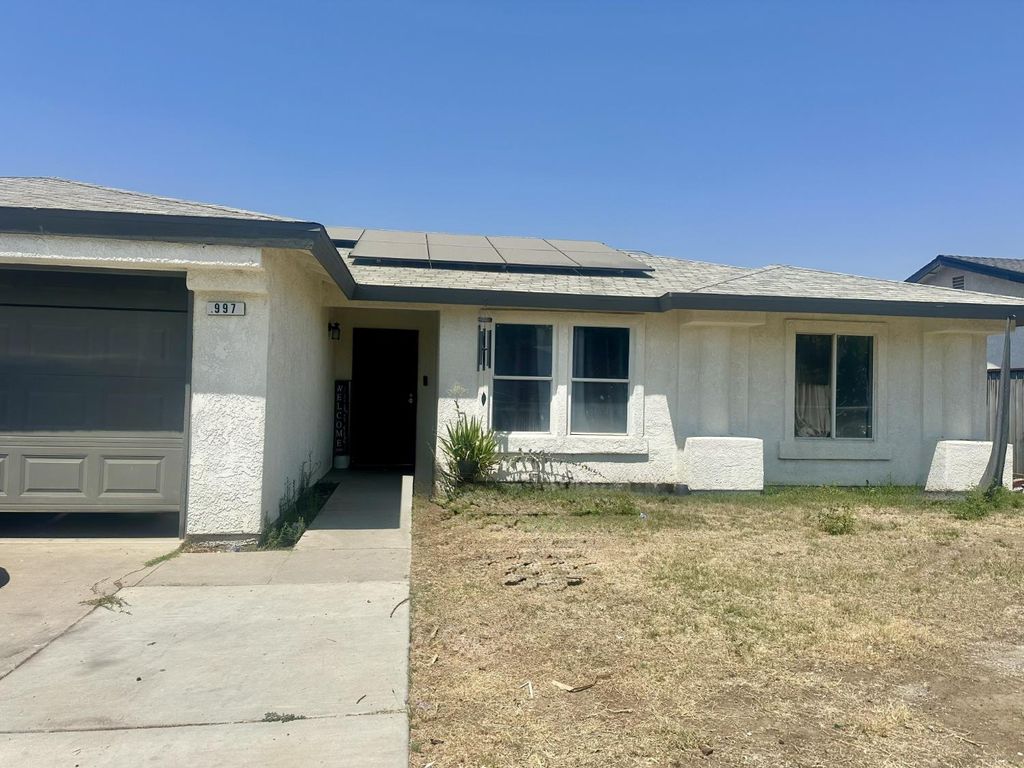 Image 1 of property listing at 997 E Jolson Avenue, Fresno, CA 93706