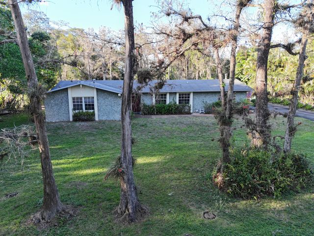 9003 NW 70th Court, Parkland, FL 33067