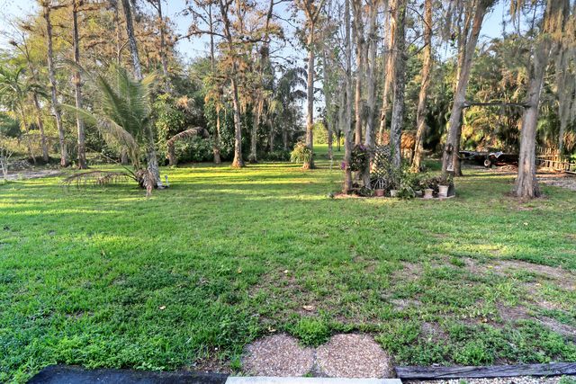 9003 NW 70th Court, Parkland, FL 33067