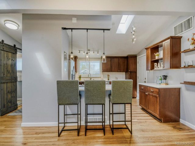 7888 Applewood Ln, Denver, CO 80221