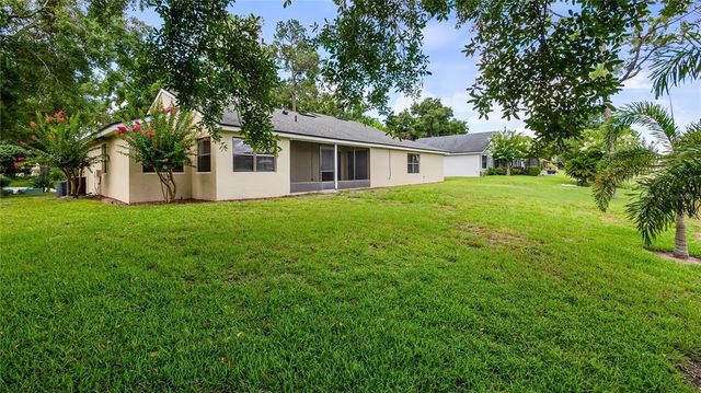 7237 WOODVILLE CRESCENT, Orlando, FL 32819
