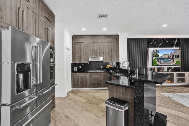 16180 SW 14th St, Pembroke Pines, FL 33027