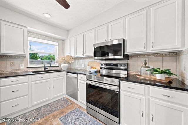 240 Micanopy Court, Indian Harbour Beach, FL 32937