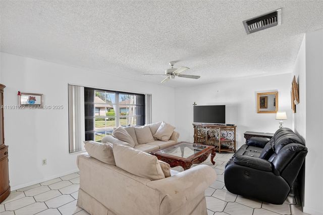 6310 Tall Cypress Circle, Greenacres, FL 33463