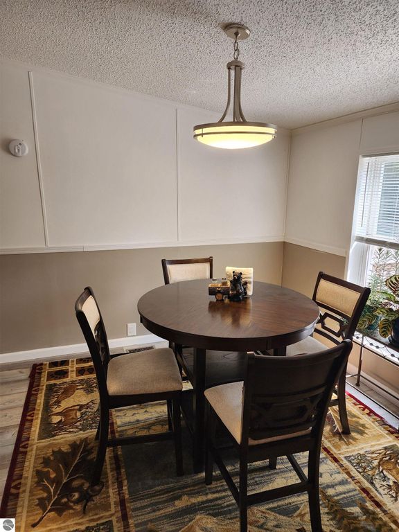 Image 13 of property listing at 3560 Pine Tree Drive, Weidman, MI 48893