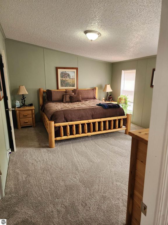 Image 16 of property listing at 3560 Pine Tree Drive, Weidman, MI 48893