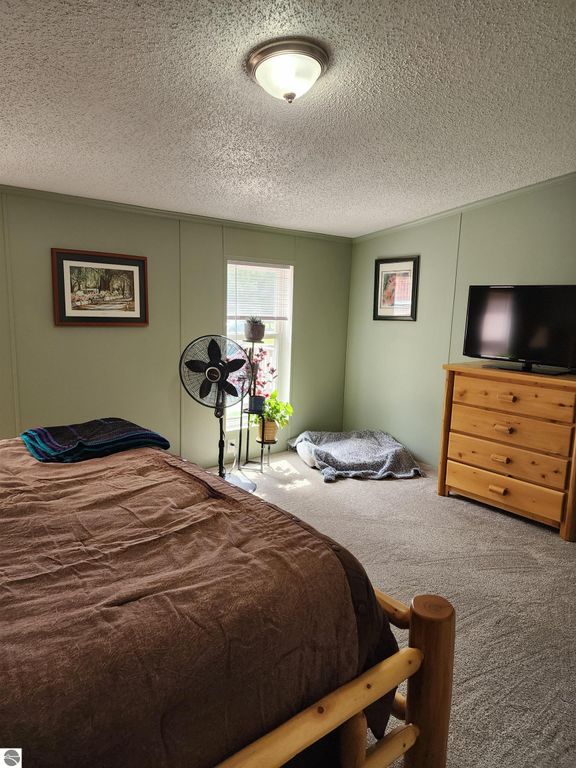 Image 17 of property listing at 3560 Pine Tree Drive, Weidman, MI 48893