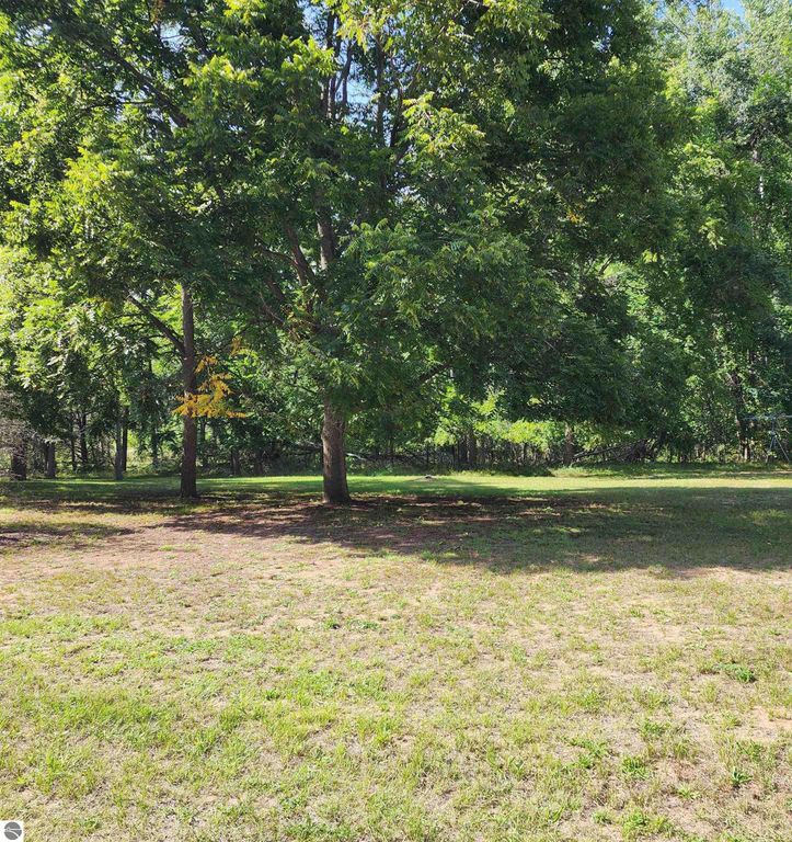 Image 2 of property listing at 3560 Pine Tree Drive, Weidman, MI 48893
