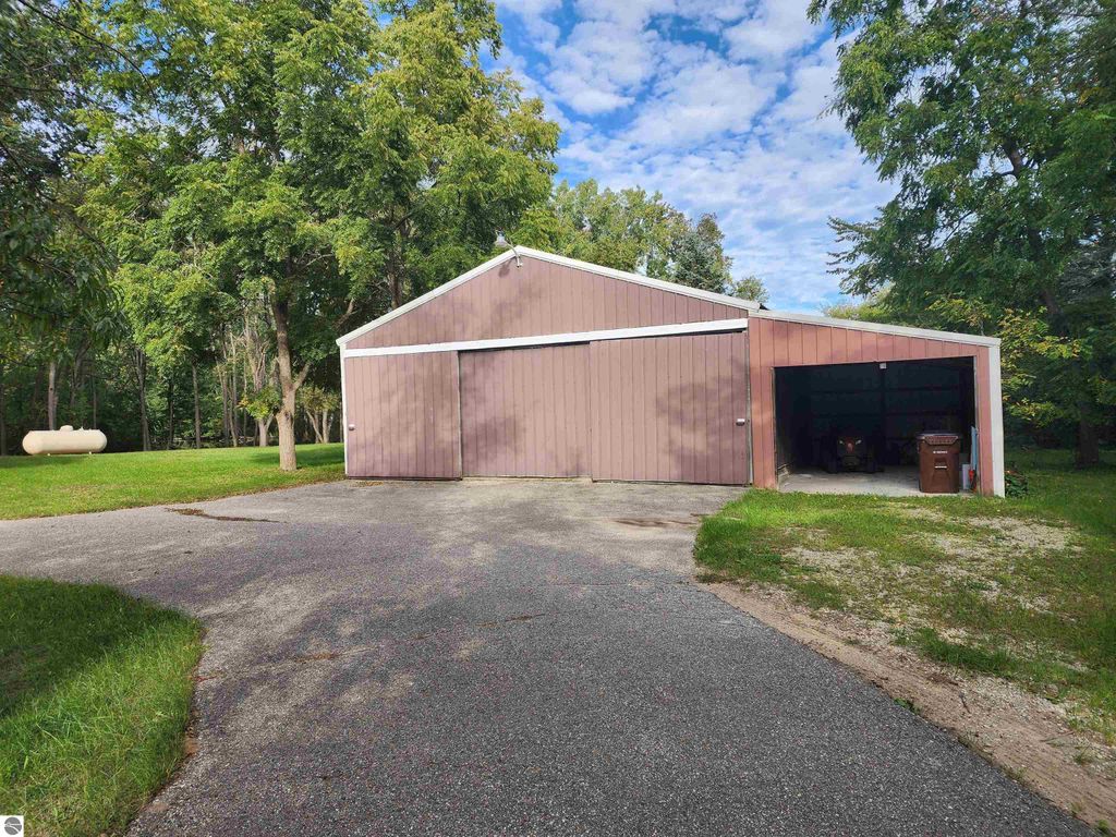 Image 37 of property listing at 3560 Pine Tree Drive, Weidman, MI 48893