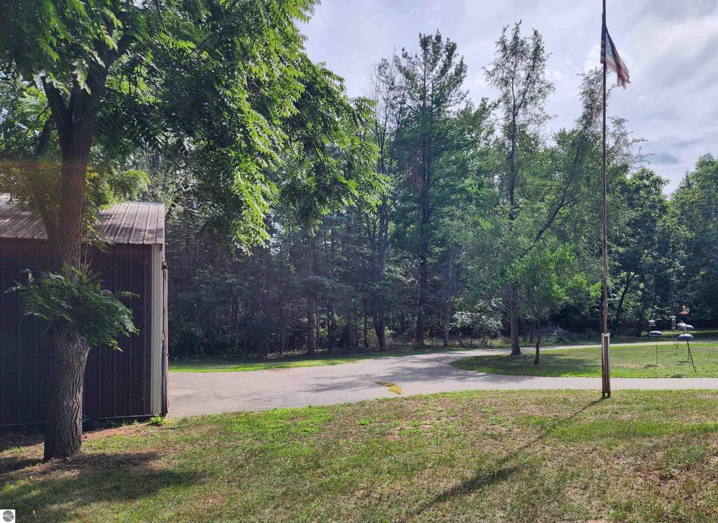 Image 5 of property listing at 3560 Pine Tree Drive, Weidman, MI 48893