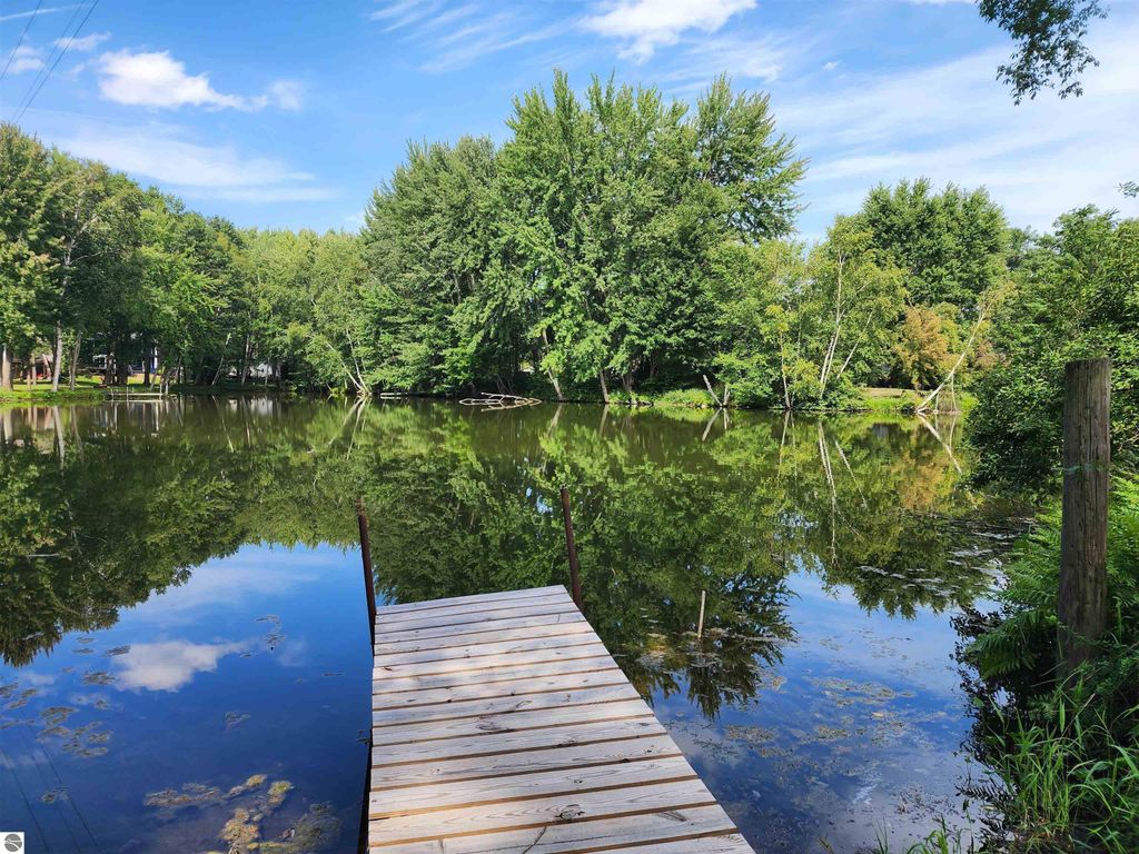 Image 6 of property listing at 3560 Pine Tree Drive, Weidman, MI 48893