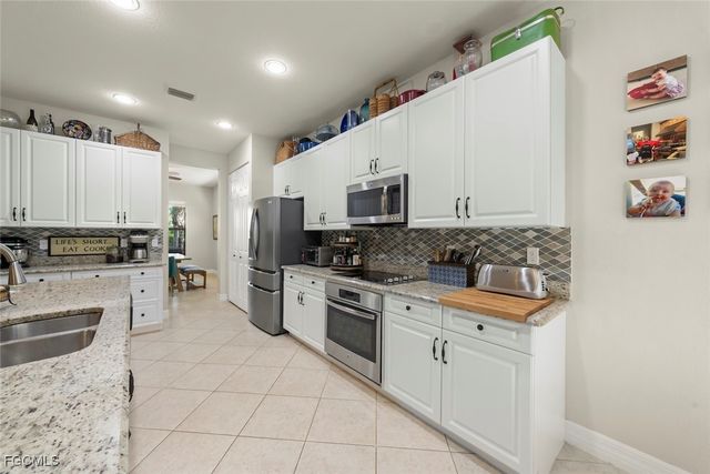 3179 Pacific DR, Naples, FL 34119