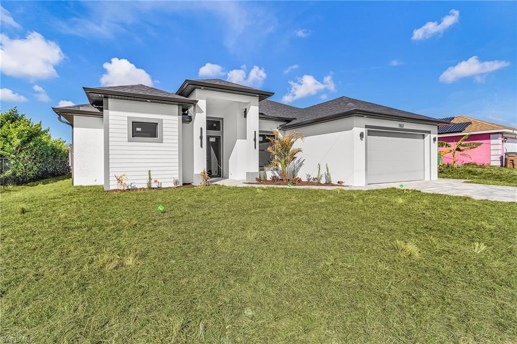 Image 2 of property listing at 1102 NE 4th PL, Cape Coral, FL 33909