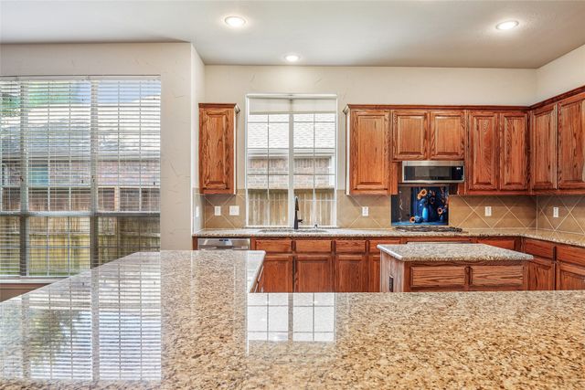 8704 Dayton Drive, Lantana, TX 76226