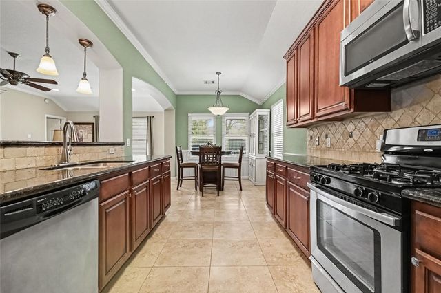 213 Rippling Creek Lane, Alvin, TX 77511