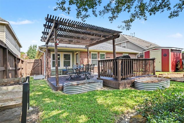 213 Rippling Creek Lane, Alvin, TX 77511