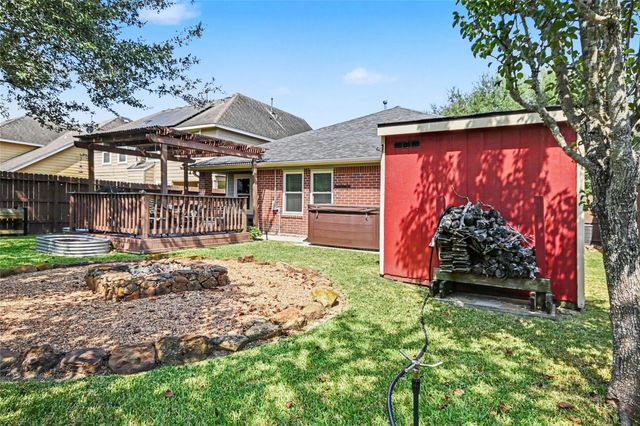 213 Rippling Creek Lane, Alvin, TX 77511