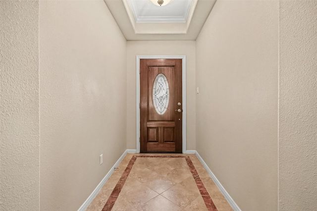 213 Rippling Creek Lane, Alvin, TX 77511