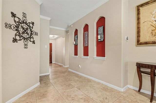 213 Rippling Creek Lane, Alvin, TX 77511