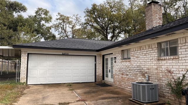 24710 Hunters Hollow Drive, Spring, TX 77380