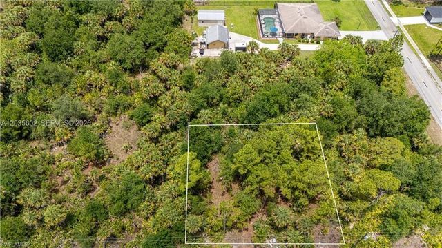 521 Clayton Avenue, Lehigh Acres, FL 33972