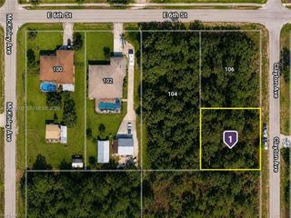 521 Clayton Avenue, Lehigh Acres, FL 33972