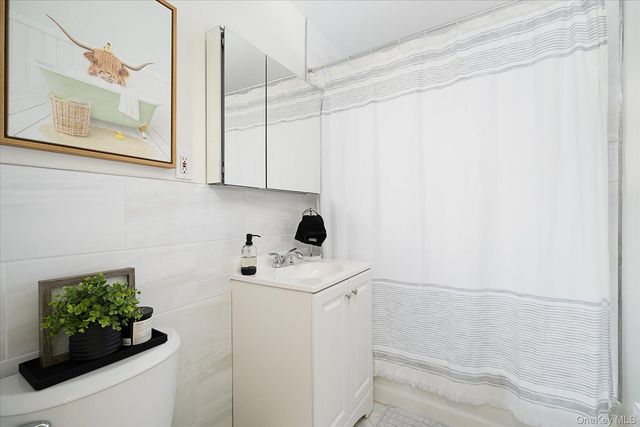 26-19 211th Street, Bayside, NY 11360