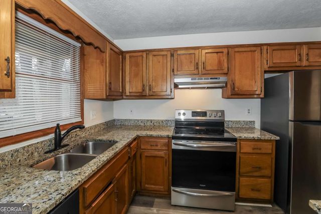 7074 Williamsburg Drive, Riverdale, GA 30274