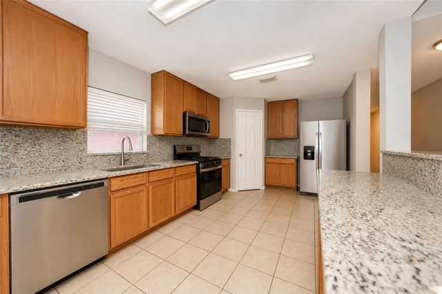 17435 S Summit Canyon Drive, Houston, TX 77095