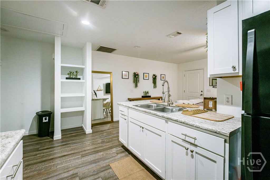 Image 13 of property listing at 36 SW Pine Street SW, Ludowici, GA 31316